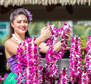 woman holding leis