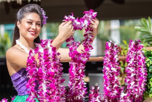 woman holding leis