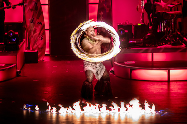 833872249-rock-a-hula-show-cast-fire-knife